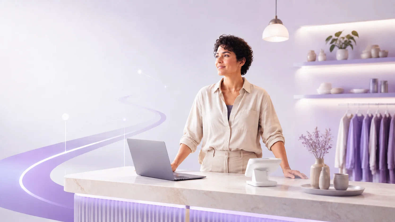 A shop owner standing at her counter with a laptop and a SMPL card terminal beside her.